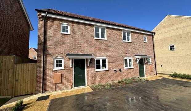 Image of new house with bright blue sky Image of new house with bright blue sky