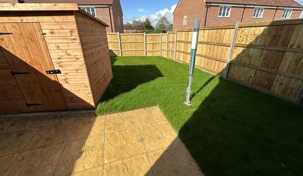 Back garden showing shed and rotary line Back garden showing shed and rotary line