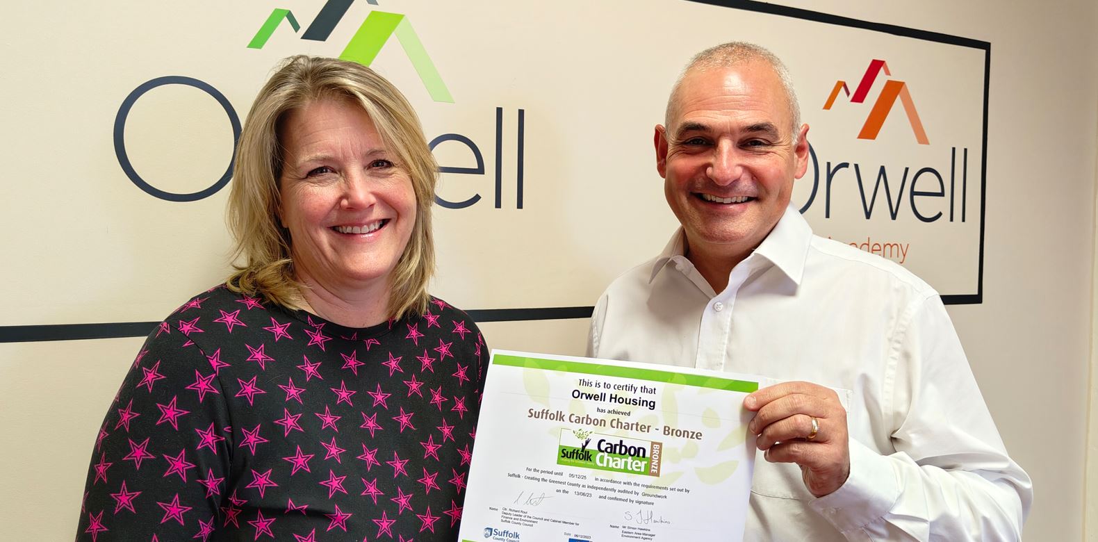 Wendy Evans Hendrick And Steven Crissal Holding The Bronze Accreditation Certificate