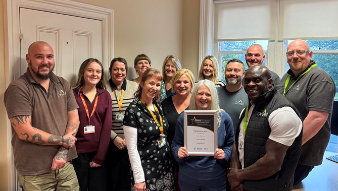 Orwell team with the caring company certificate