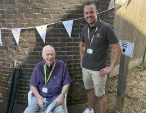 Jon, standing next to one of our members of the Orwell Resident Group.
